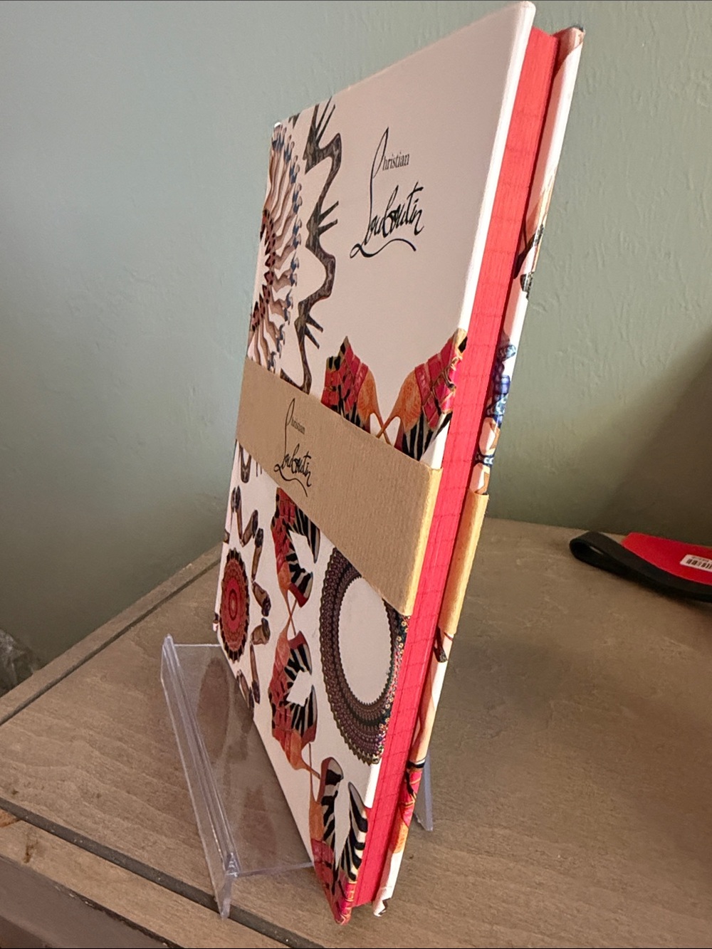 Christian Louboutin White Notebook with Red, Orange, Brown, and Black Accents - Picture 2 of 7